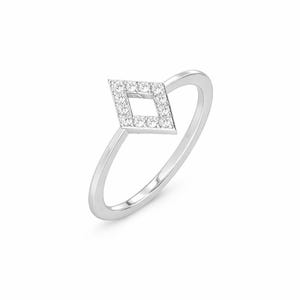May include: A silver ring featuring a diamond-shaped design encrusted with small, clear gemstones. The ring has a thin, polished band and a geometric, open-center design. The gemstones sparkle against the silver.
