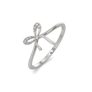 May include: A silver ring with a bow design. The bow is adorned with small, sparkling gemstones. The ring has a delicate, minimalist style, perfect for everyday wear or special occasions. The ring is made of a shiny, reflective metal.