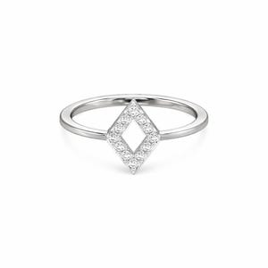 May include: A silver ring featuring a diamond-shaped design. The diamond shape is filled with small, sparkling stones, creating a dazzling effect. The ring band is a simple, polished silver.