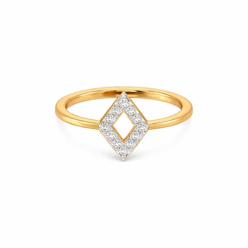 May include: A gold ring with a diamond-shaped centerpiece. The centerpiece is filled with small, round, white gemstones. The band of the ring is a thin, polished gold. The ring is set against a white background.
