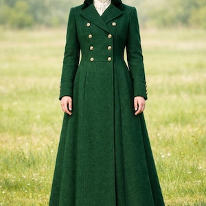 May include: A long, emerald green wool coat with a double-breasted design and gold buttons. The coat features a velvet collar and is from Regimental Wool Co. The coat is floor-length and has long sleeves.