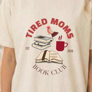 May include: A set of three ceramic mugs with a speckled, matte finish in cream, light grey, and dark grey. Each mug has a simple, minimalist design and a rounded handle.