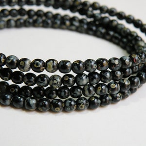 Jet Black colorful Picasso finish round Druk Czech glass beads 4mm half strand ND4-37