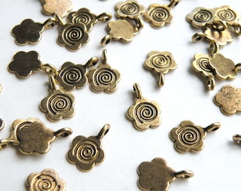 10 Flower glue on bails antique gold plated 15x11mm DB11245