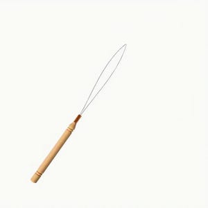 May include: A wooden hair extension tool with a thin metal loop. The handle is light brown with a copper-colored connector. The tool is designed for applying hair extensions.