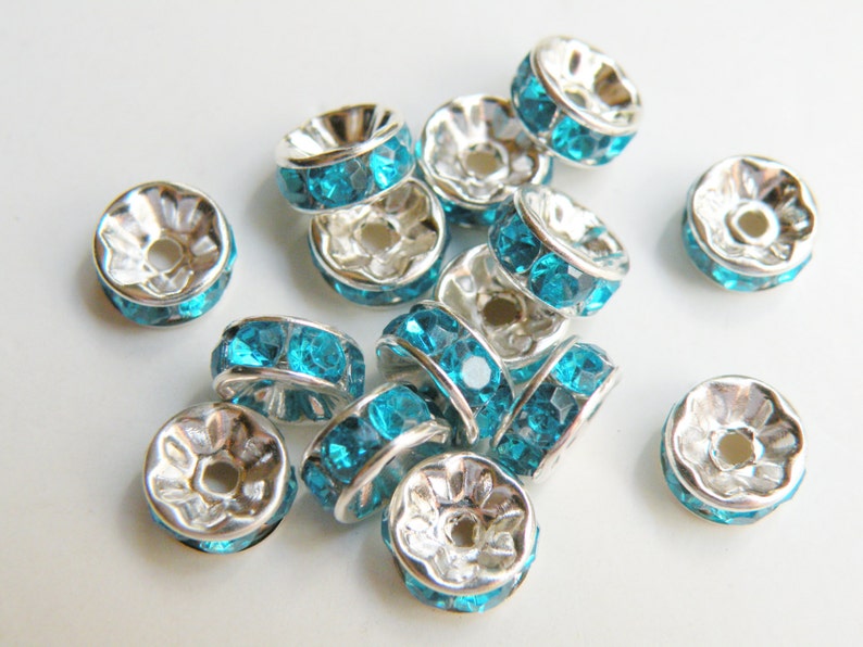 20 Aquamarine Blue rhinestone rondelle spacer beads 8mm DB19828 Bild 1