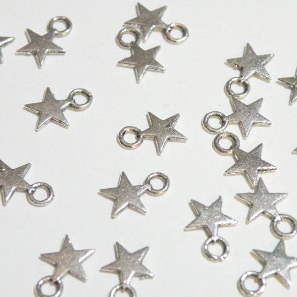 50 Tiny star charms antique silver 11x8mm DB00349