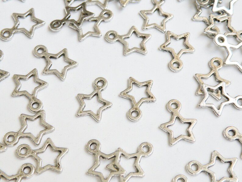 20 Little Open Star Charms antique silver 14x11mm PLF10686Y image 1