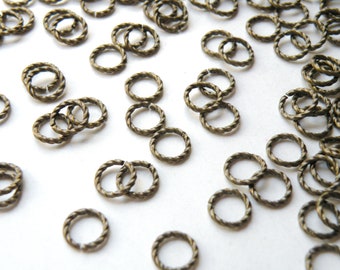 25 Fancy twisted jump rings round open antique bronze antique brass 8mm 16 gauge A5032FN