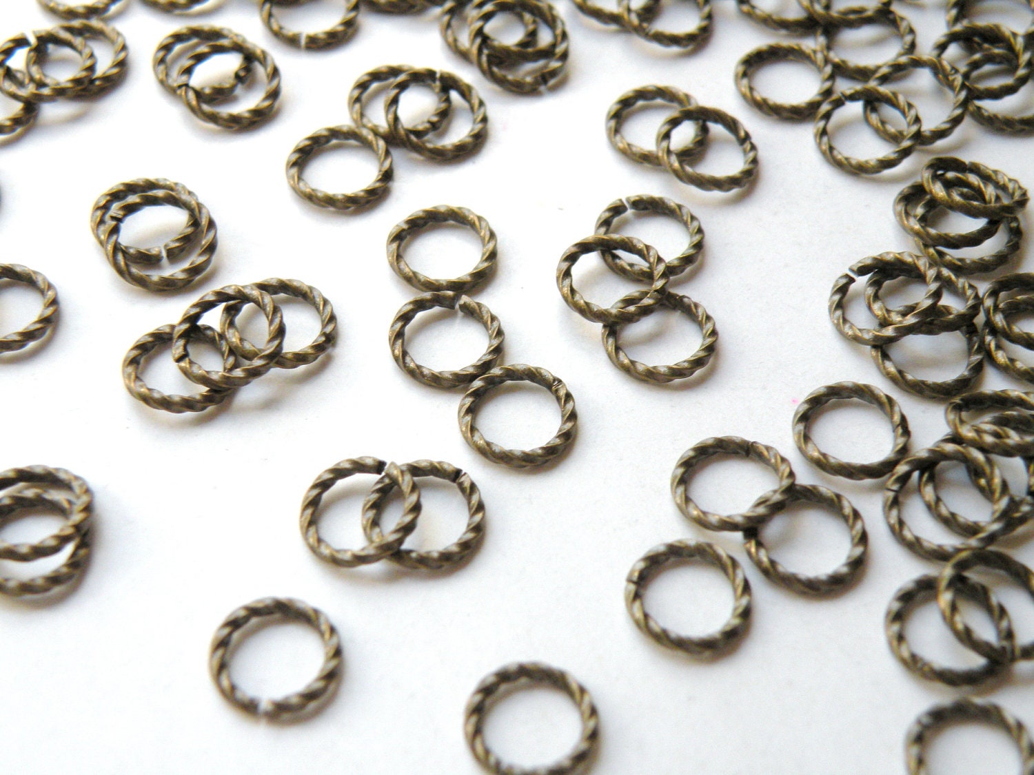 25 Fancy twisted jump rings round open antique bronze plated Etsy