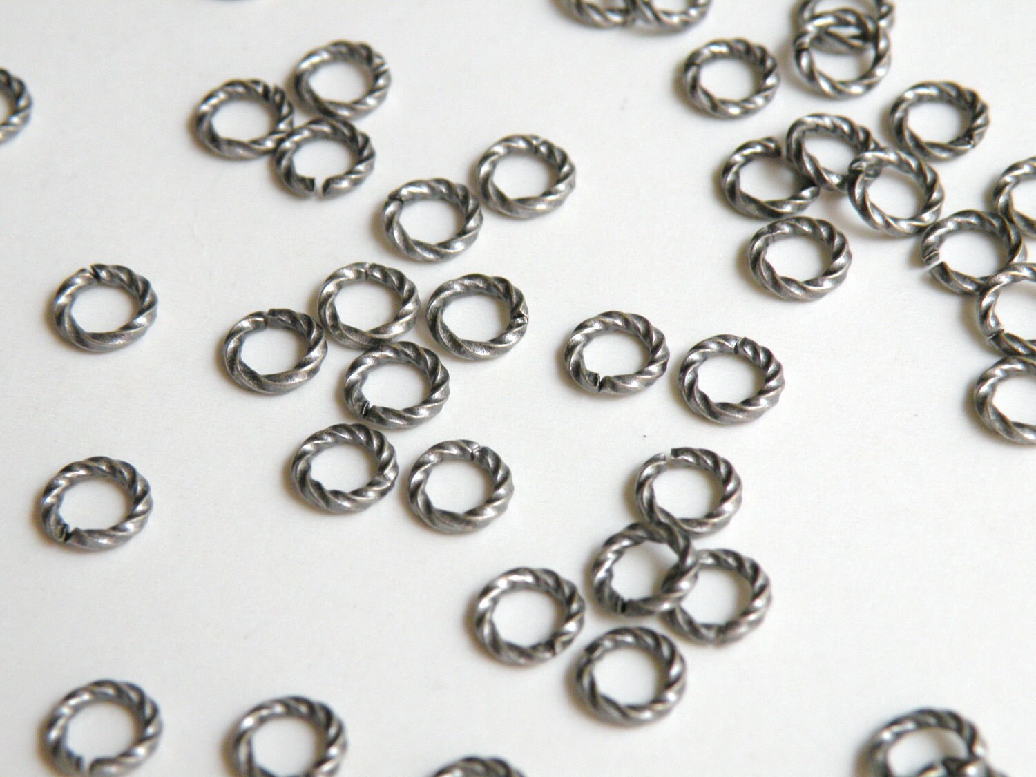 25 Fancy Twisted Jump Rings Open Round Antique Silver Plated Brass
