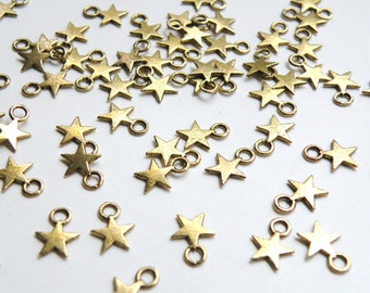 50 Tiny star charms antique gold plated 11x8mm DB00996