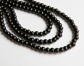 Glossy jet black opaque glass beads round 4mm 32 inch strand DB10836