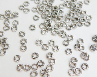 50 Twisted rondelle spacer beads round closed soldered jump rings antique silver 4-5mm 20 gauge DB25851