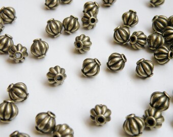 20 Lantern or melon shaped spacer beads antique bronze 8mm DB12803