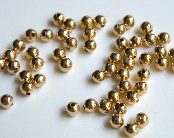 50 Round smooth ball spacer beads shiny gold plated nickel free brass 4mm 1475MB