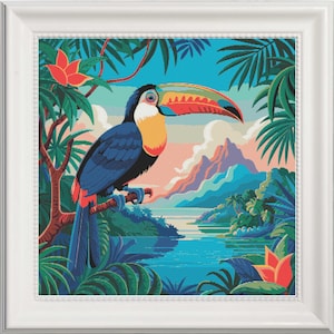May include: A framed, colorful illustration of a toucan perched on a branch, set against a tropical landscape. The bird has a large, multi-colored beak, blue body, and red tail feathers. The background features a lake, mountains, and lush greenery.