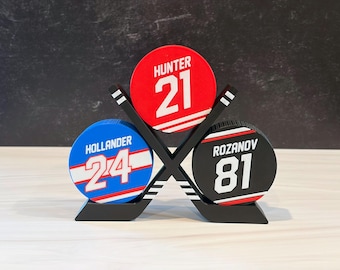 Hockey Pucks & Ständer