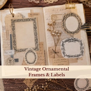 May include: An open journal featuring various paper ephemera, including rectangular and oval ornamental frames, vintage-style labels, and dried flowers. The pages contain printed text, script, and stamps, with a gold binder clip at the top.