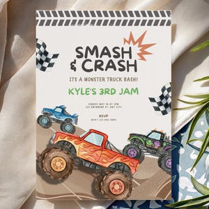 May include: A party invitation with the text "SMASH & CRASH" and "KYLE'S 3RD JAM". The invitation features watercolor illustrations of monster trucks in red, blue, and black, along with checkered flags.