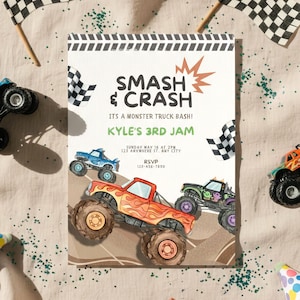 May include: A party invitation with the text "SMASH & CRASH" and "KYLE'S 3RD JAM". The invitation features watercolor illustrations of monster trucks in red, blue, and green, with checkered flags and confetti.