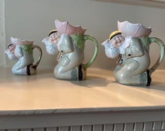 Zestaw 3 dzbanków do mleka Schafer & Vater w kształcie figurki Holenderskiego Człowieka, porcelana niemiecka