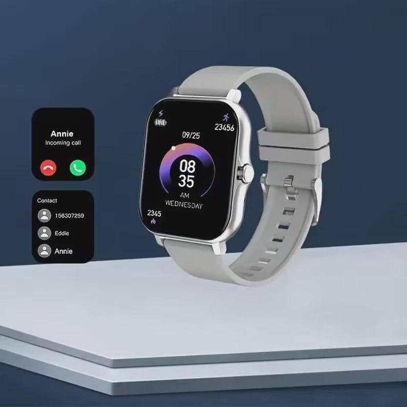 May include: A silver smartwatch with a gray band displays the time, date, and incoming call information. The screen shows the time as 08:35 AM on Wednesday, with a date of 09/25. Additional screens show contact information and an incoming call from "Annie."