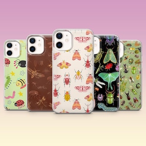 May include: A collection of phone cases with insect-themed designs. The cases feature various colorful bugs, butterflies, and other insects on a variety of backgrounds, including green, brown, and cream. The cases are made of clear plastic.