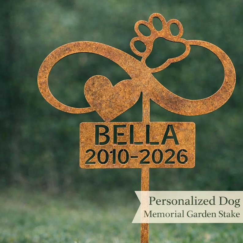 May include: A personalized dog memorial garden stake made of rusted metal. The design includes an infinity symbol, a heart, and a paw print. The name "BELLA" and the years 2010-2026 are displayed on a rectangular plaque.