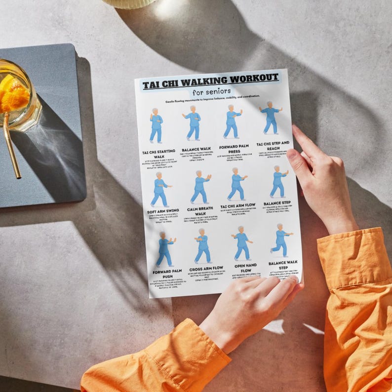 May include: A poster titled "TAI CHI WALKING WORKOUT for seniors" is held by a person. The poster shows illustrations of Tai Chi movements with text descriptions. The person is wearing an orange long-sleeved shirt. The poster is white.