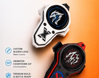 May include: Two Beyblade X Atlas Battlepass display devices. One is white with a blue wolf logo and an X emblem. The other is black and red with a white graphic and a blue cross. Text includes BEYBLADE X, ATLAS BATTLEPASS DISPLAY, and feature labels.