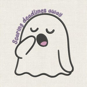 May include: A white ghost embroidery design with black outlines and the text "Scaring deadlines away" in purple. The ghost has closed eyes and an open mouth with a pink interior, as if yawning.