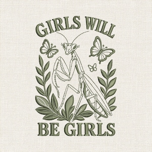 May include: An olive green embroidery design on a light fabric background featuring a praying mantis centered between two leafy branches and two butterflies. The text GIRLS WILL BE GIRLS is arched above and positioned below the insect illustration.