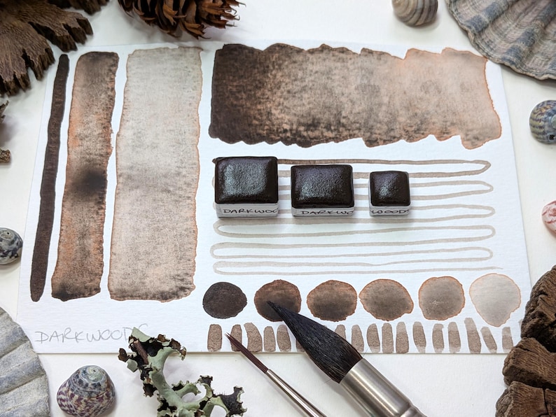 Darkwoods: handmade granulating brown-black watercolour paint with red undertone in half, quarter, and eighth pans. Vegan watercolor binder bild 1