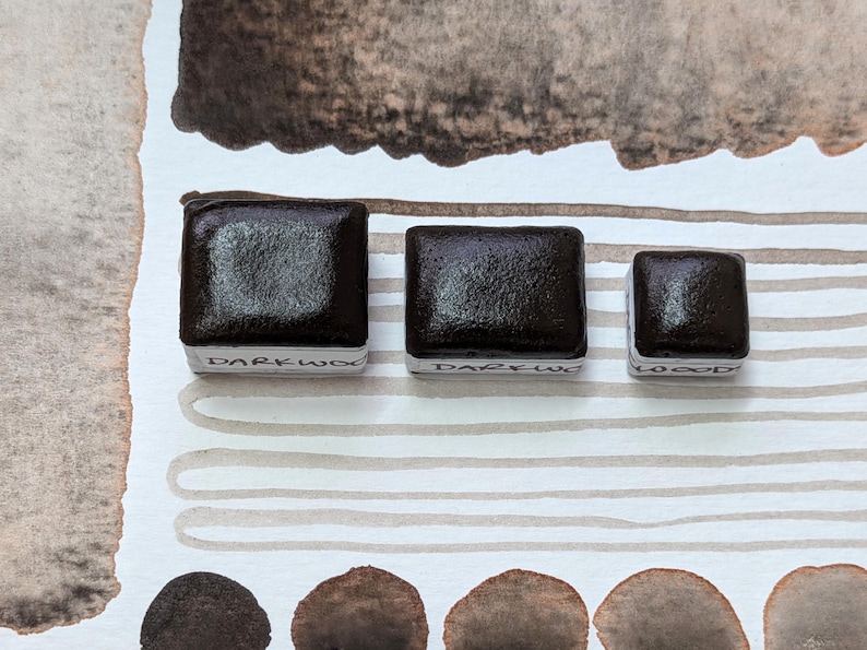 Darkwoods: handmade granulating brown-black watercolour paint with red undertone in half, quarter, and eighth pans. Vegan watercolor binder bild 2