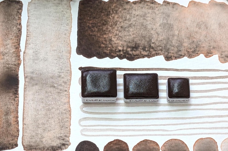 Darkwoods: handmade granulating brown-black watercolour paint with red undertone in half, quarter, and eighth pans. Vegan watercolor binder bild 6