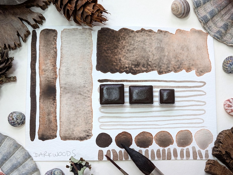 Darkwoods: handmade granulating brown-black watercolour paint with red undertone in half, quarter, and eighth pans. Vegan watercolor binder bild 8
