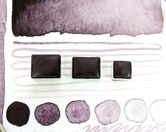 August purple - dark berries: deep blackberry or elderberry hue with black granulation. Handmade vegan watercolour paint in 3 pan sizes