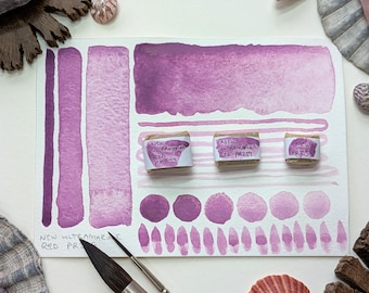 New ultramarine red PR259: handmade granulating rose pink watercolour paint, in half, quarter, and eighth/mini pans. Vegan watercolor binder