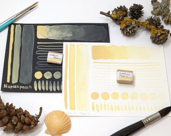 Naples peach: handmade apricot yellow-orange watercolour paint in half or quarter pans, made with vegan watercolor binder. Opaque colour.