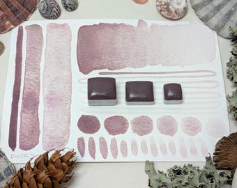 Dusky rose: handmade watercolour paint in granulating pink with grey tones in half, quarter & eighth/mini pans, with vegan watercolor binder