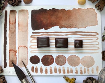 Ember brown: rich chestnut brown granulating handmade watercolour paint, made with vegan watercolor binder in half, quarter, or eighth pans
