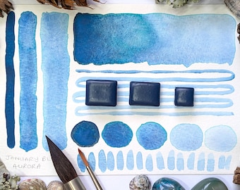 January blue - aurora: blue-green handmade watercolour paint - granulating hand-mulled watercolor in half, quarter, and eighth pans. Vegan