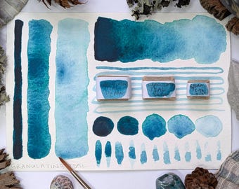 Granulating teal: blue-green handmade watercolour paint - hand-mulled granulation watercolor in half, quarter, & eighth pans. Vegan binder.