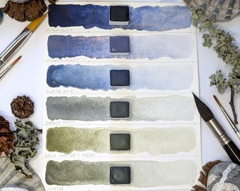 Light on the Fens: unique handmade watercolour paint set of 6 sky & water hues, made with vegan watercolor binder. Half, quarter, eighth pan
