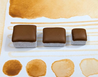 French light ochre PY43: warm opaque yellow-orange handmade watercolour paint. Hand-mulled watercolor in 3 pan sizes, made with vegan binder