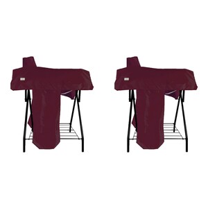 May include: Two identical dark maroon grill covers draped over black metal stands. Each cover features a rectangular white label on the front left side. The stands have a simple four-legged frame with a lower wire rack shelf for storage.