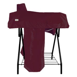 May include: A deep burgundy protective cover draped over a black metal stand. The cover features a rectangular shape with a small white label on the front left side. The stand has a wire rack base and four thin black legs supporting the structure.