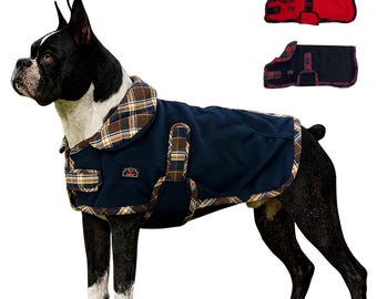 May include: A navy blue dog coat with a brown, white, and yellow plaid collar and trim. The coat features adjustable straps with matching plaid accents and a small rectangular logo patch. Two additional coats are shown in red and black.
