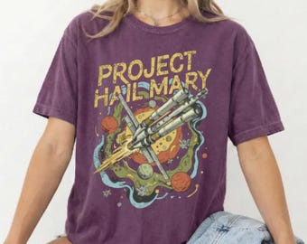 Projet unisexe Je vous salue, Mary vaisseau spatial T-shirt fusée de science-fiction Illustration confort couleurs Rocky Amaze Teeshirt t-shirt amateur de livres, t-shirt extraterrestre drôle